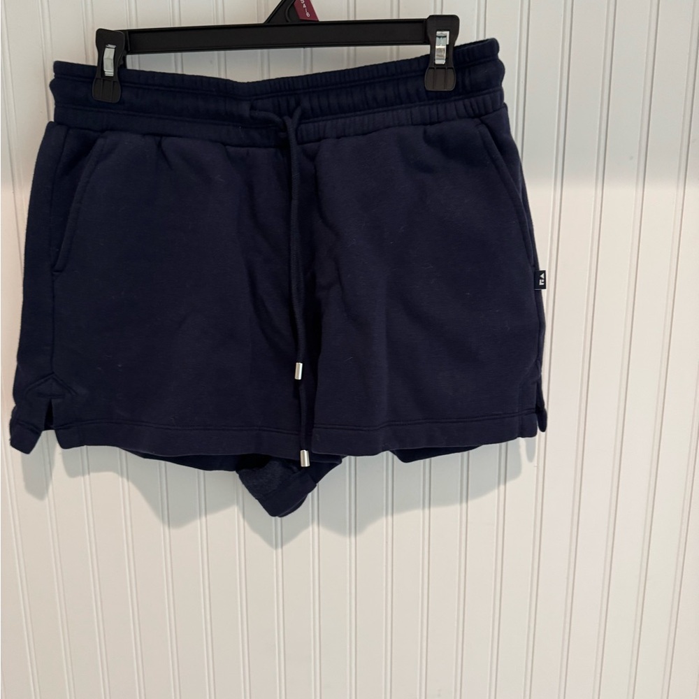 Navy sweat shorts.